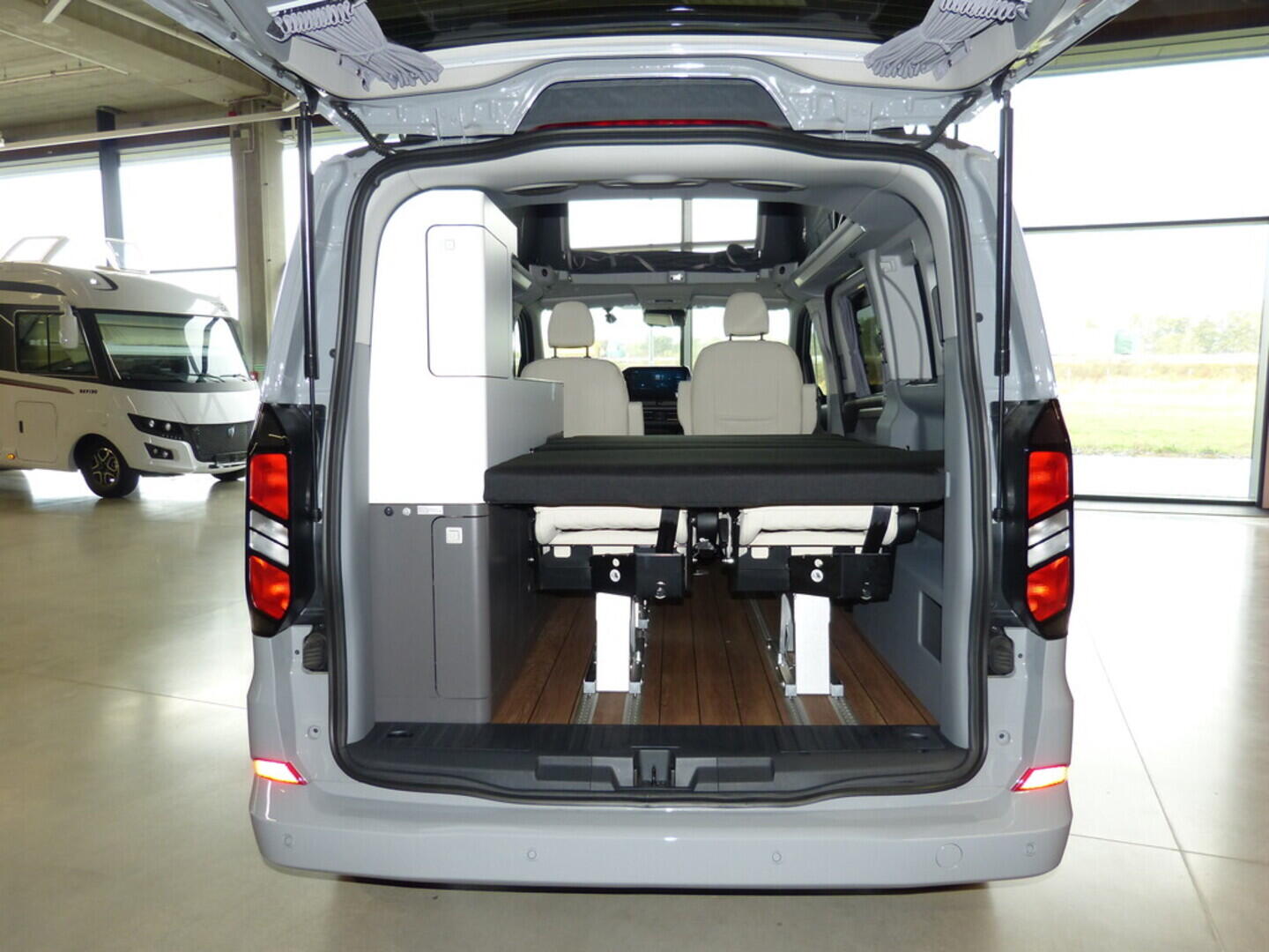 OF06300042_22.webp_CITY CAMP SELECT AWD FORD 125 kW