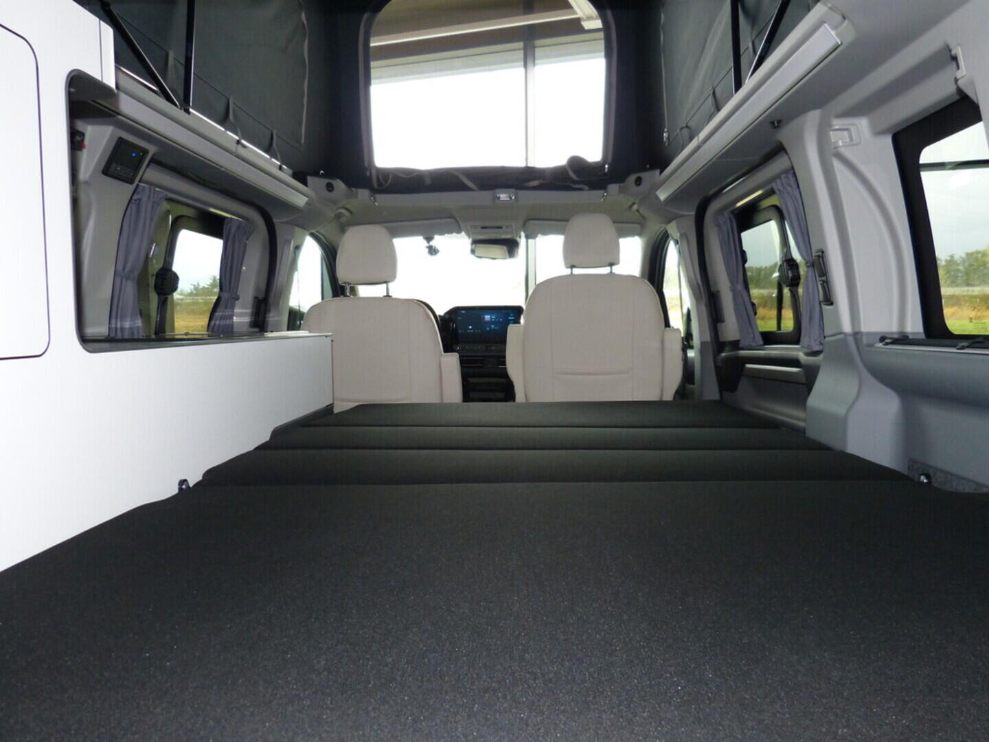 OF06300042_23.webp_CITY CAMP SELECT AWD FORD 125 kW