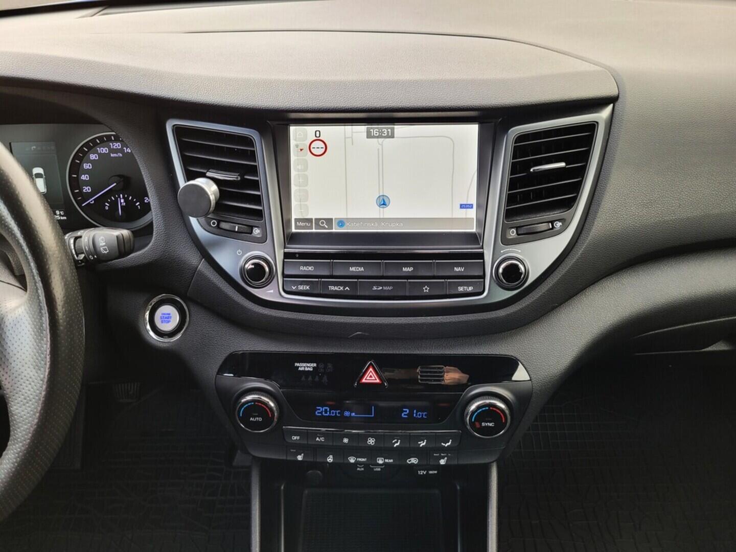 O619V07411_34.webp_TUCSON Style 2.0  100 kW manuál